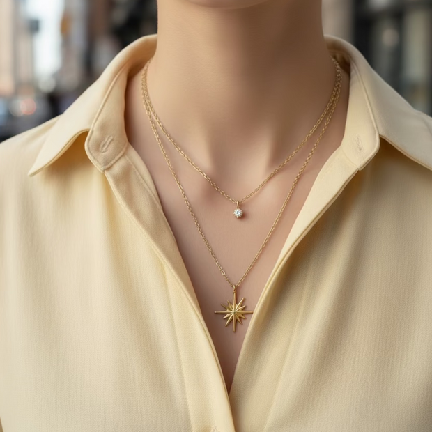 Two layer gold starburst necklace with zirconia accents