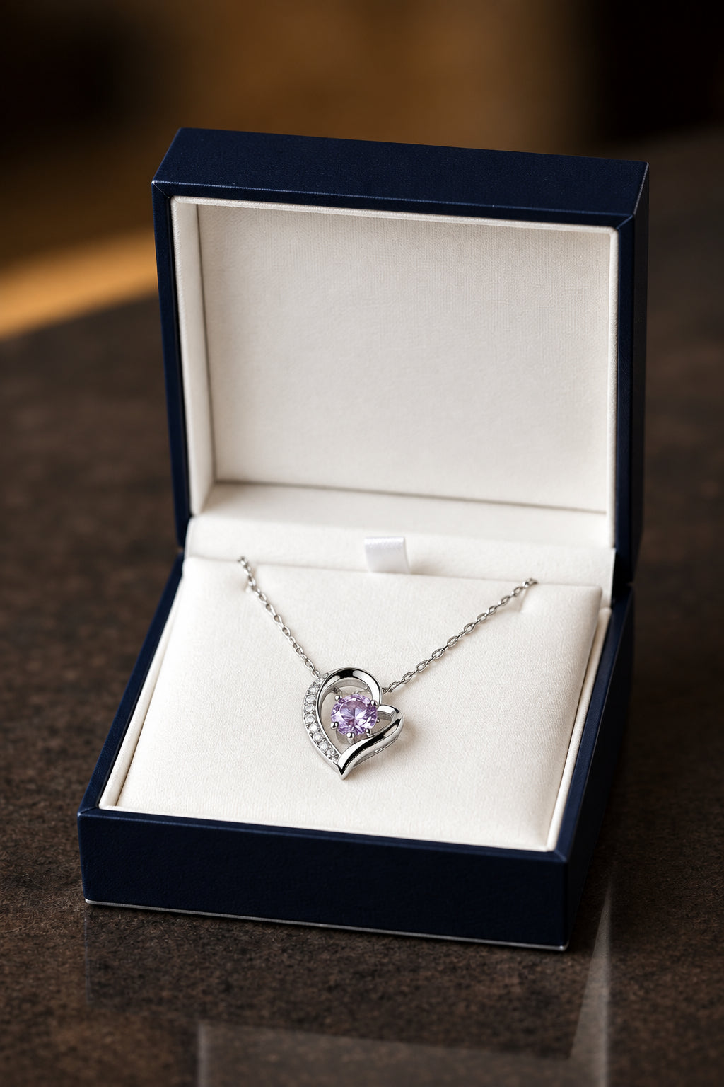 NEW ITEM!     Sterling Silver Heart with Purple Zirconia Stone