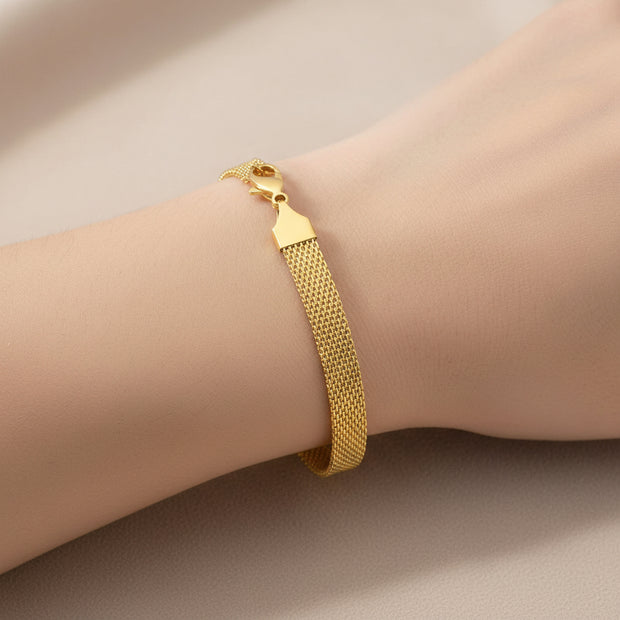 18K gold plated stainless steel bracelet on neutral background